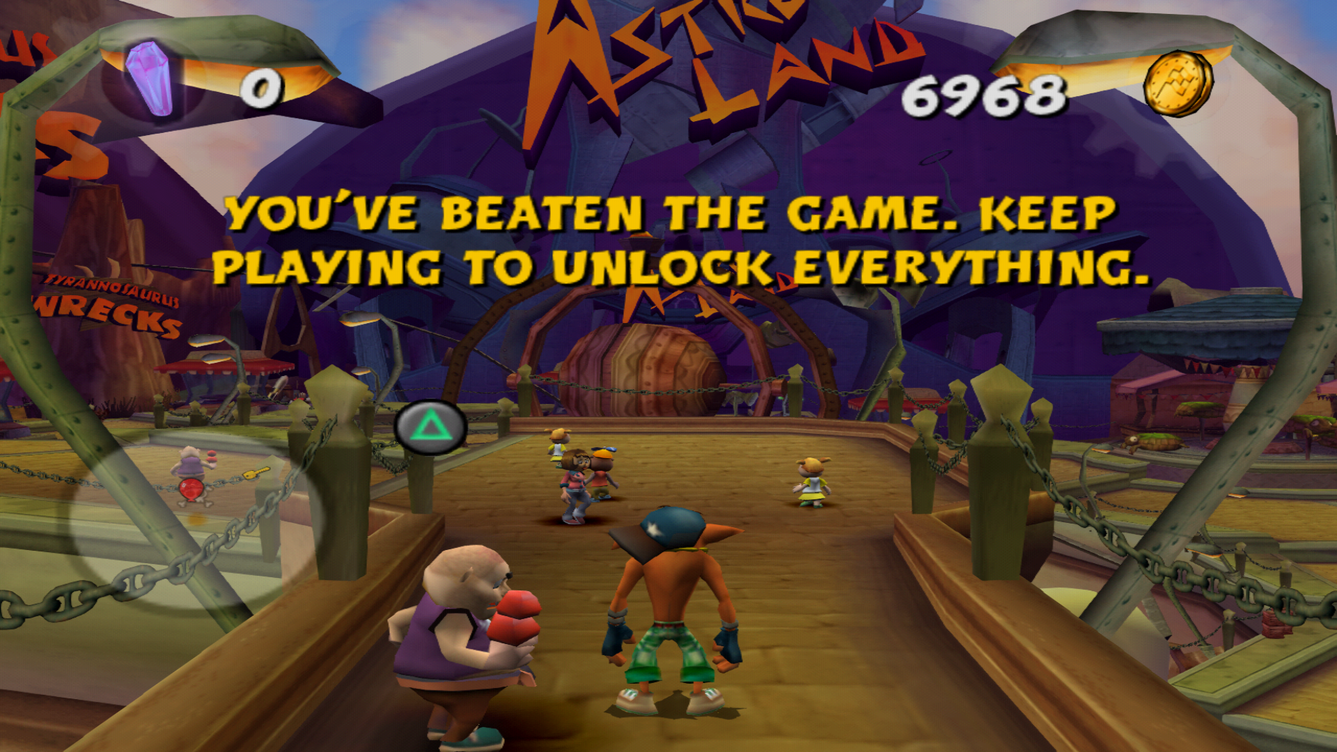 A screenshot of Crash Tag Team Racing. Text above Crash says 'You've beaten the game. Keep playing to unlock everything.'