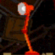 Small gif of a red desk lamp, swivelling it's arm thing back and forth